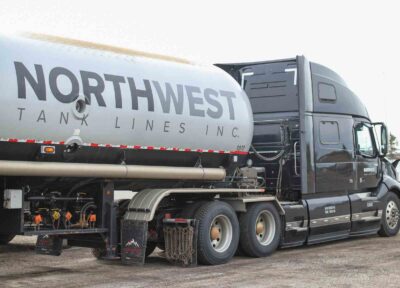Commercial tanker truck used for transportation safety, featuring a professionally maintained liquid bulk trailer designed to support the safe and compliant transport of hazardous and non-hazardous liquid products.